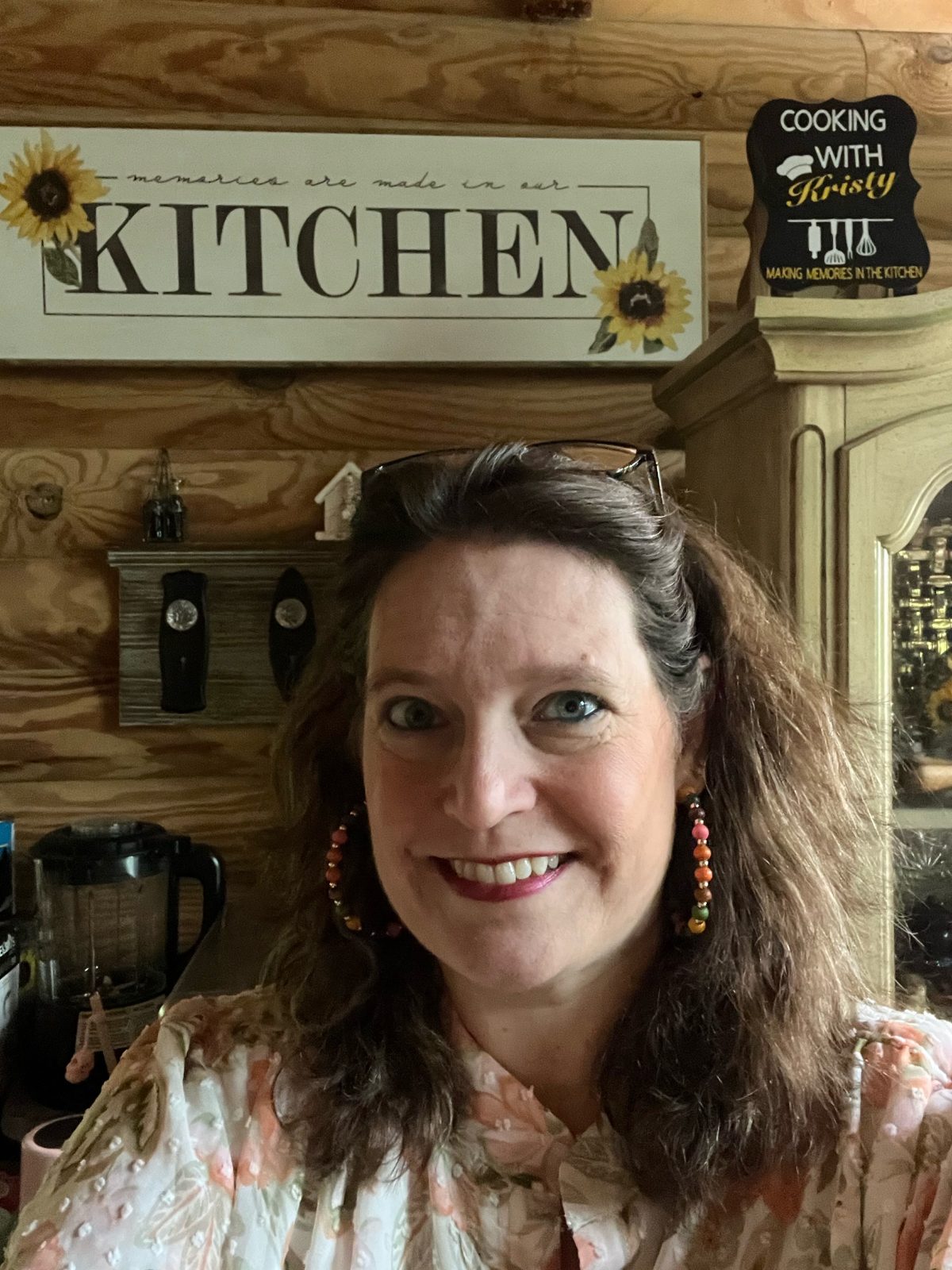 Kristy in her wood kitchen
