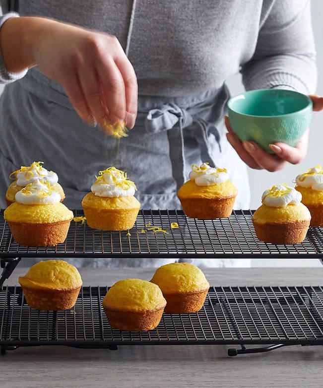 Pampered Chef Stackable Cooling Rack Set holding fresh-baked cupcakes